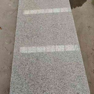 六盘水芝麻白光面毛板